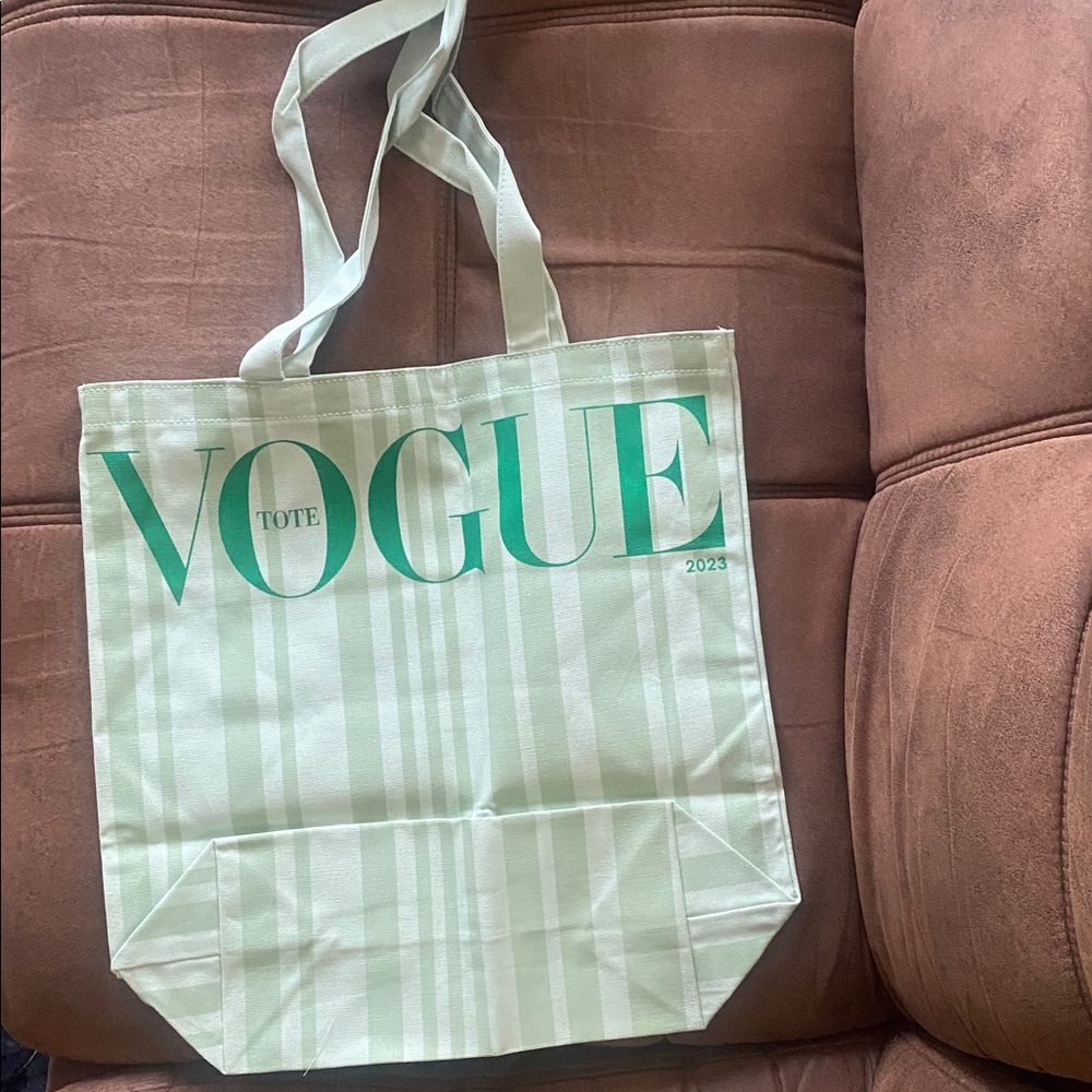 2 Vogue Tote Bags.. 1 Green and 1 black/White Tote Bag